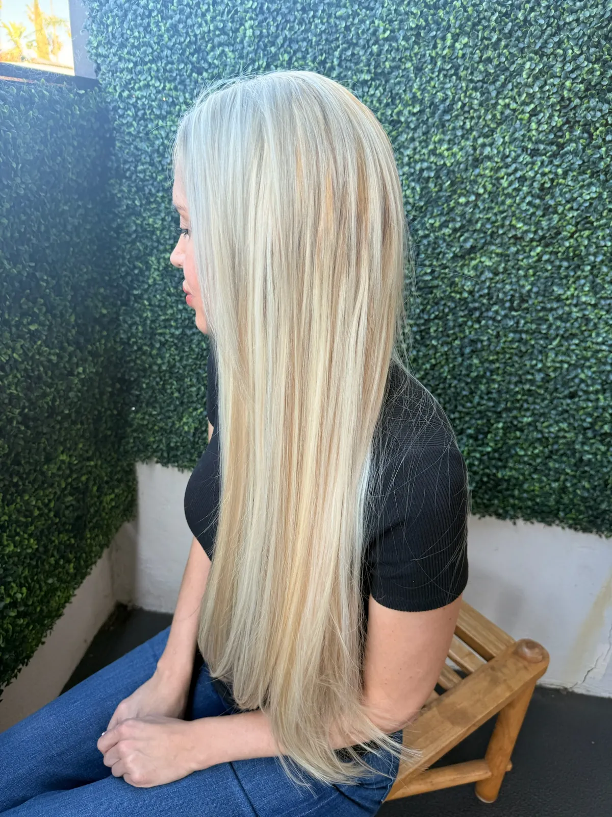 After: platinum blonde hair past the waist from the side.