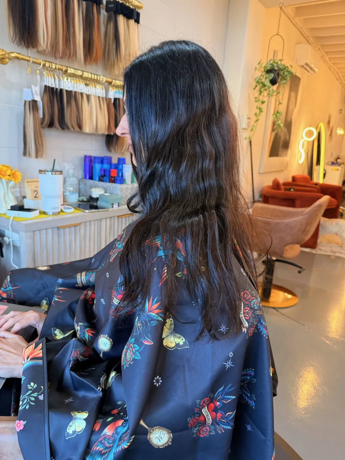 Before: wavy black hair from the side.